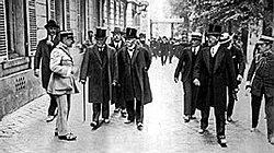 British prime minister Lloyd George, French prime minister Clemenceau, and US president Woodrow Wilson in Versailles for the signing of the peace treaty with Germany.